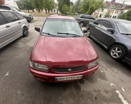 Червоний Мазда 323, об'ємом двигуна 1.5 л та пробігом 250 тис. км за 2500 $, фото 2 на Automoto.ua