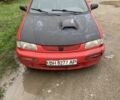 Красный Мазда 323, объемом двигателя 0 л и пробегом 145 тыс. км за 600 $, фото 1 на Automoto.ua