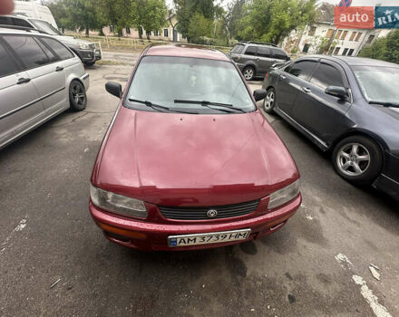 Красный Мазда 323, объемом двигателя 1.5 л и пробегом 295 тыс. км за 2500 $, фото 2 на Automoto.ua