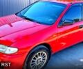 Красный Мазда 323, объемом двигателя 1.5 л и пробегом 200 тыс. км за 2200 $, фото 1 на Automoto.ua