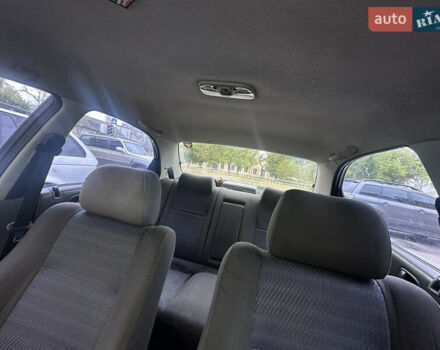 Красный Мазда 323, объемом двигателя 1.5 л и пробегом 295 тыс. км за 2500 $, фото 5 на Automoto.ua