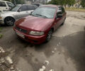 Красный Мазда 323, объемом двигателя 1.5 л и пробегом 295 тыс. км за 2500 $, фото 1 на Automoto.ua
