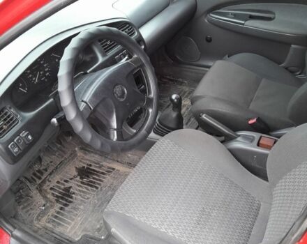 Червоний Мазда 323, об'ємом двигуна 1.5 л та пробігом 290 тис. км за 2800 $, фото 3 на Automoto.ua