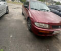 Красный Мазда 323, объемом двигателя 1.5 л и пробегом 295 тыс. км за 2500 $, фото 1 на Automoto.ua