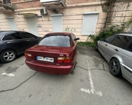 Червоний Мазда 323, об'ємом двигуна 1.5 л та пробігом 250 тис. км за 2500 $, фото 3 на Automoto.ua
