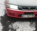 Красный Мазда 323, объемом двигателя 1.5 л и пробегом 381 тыс. км за 1600 $, фото 1 на Automoto.ua