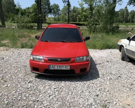 Красный Мазда 323, объемом двигателя 1.5 л и пробегом 323 тыс. км за 2800 $, фото 5 на Automoto.ua