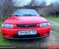 Червоний Мазда 323, об'ємом двигуна 1.5 л та пробігом 244 тис. км за 2000 $, фото 1 на Automoto.ua