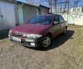 Красный Мазда 323, объемом двигателя 1.5 л и пробегом 282 тыс. км за 1500 $, фото 1 на Automoto.ua