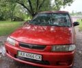 Красный Мазда 323, объемом двигателя 0 л и пробегом 366 тыс. км за 1526 $, фото 1 на Automoto.ua