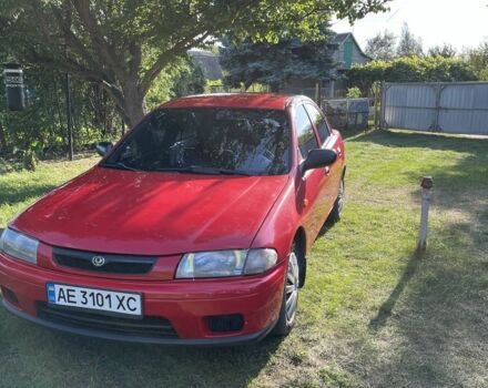 Красный Мазда 323, объемом двигателя 1.5 л и пробегом 323 тыс. км за 2800 $, фото 2 на Automoto.ua