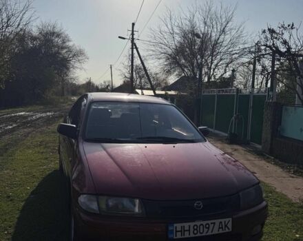 Червоний Мазда 323, об'ємом двигуна 1.8 л та пробігом 1 тис. км за 2450 $, фото 3 на Automoto.ua