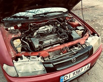Красный Мазда 323, объемом двигателя 1.5 л и пробегом 0 тыс. км за 1600 $, фото 2 на Automoto.ua