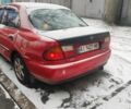 Красный Мазда 323, объемом двигателя 1.5 л и пробегом 381 тыс. км за 1450 $, фото 2 на Automoto.ua