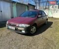 Красный Мазда 323, объемом двигателя 1.49 л и пробегом 282 тыс. км за 1400 $, фото 1 на Automoto.ua