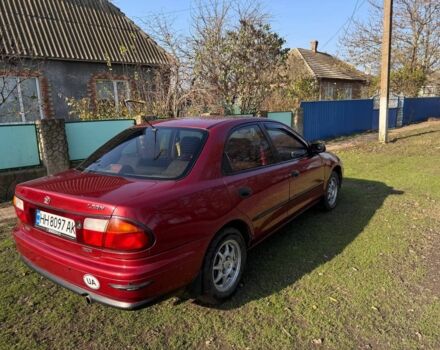 Червоний Мазда 323, об'ємом двигуна 1.8 л та пробігом 1 тис. км за 2450 $, фото 2 на Automoto.ua