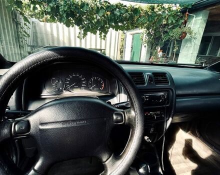 Красный Мазда 323, объемом двигателя 1.5 л и пробегом 0 тыс. км за 1600 $, фото 4 на Automoto.ua