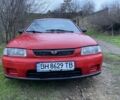 Красный Мазда 323, объемом двигателя 1.5 л и пробегом 2 тыс. км за 2000 $, фото 1 на Automoto.ua