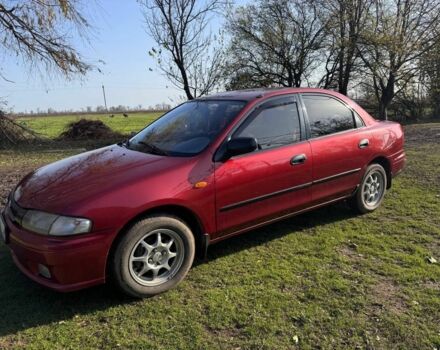 Червоний Мазда 323, об'ємом двигуна 1.8 л та пробігом 1 тис. км за 2450 $, фото 1 на Automoto.ua