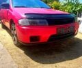 Красный Мазда 323, объемом двигателя 1.8 л и пробегом 300 тыс. км за 2300 $, фото 1 на Automoto.ua