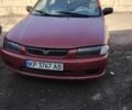 Красный Мазда 323, объемом двигателя 1.5 л и пробегом 520 тыс. км за 1500 $, фото 1 на Automoto.ua