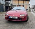 Красный Мазда 323, объемом двигателя 1.5 л и пробегом 380 тыс. км за 950 $, фото 1 на Automoto.ua