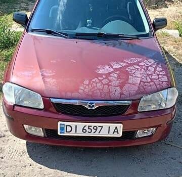 Червоний Мазда 323, об'ємом двигуна 1.5 л та пробігом 321 тис. км за 2500 $, фото 5 на Automoto.ua