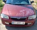 Червоний Мазда 323, об'ємом двигуна 1.5 л та пробігом 321 тис. км за 2500 $, фото 5 на Automoto.ua