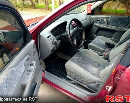Мазда 323 1999 в Одессе на Automoto.ua Красный Мазда 323, объемом двигателя 1.5 л и пробегом 331 тыс. км за 2700 $, фото 13 на Automoto.ua