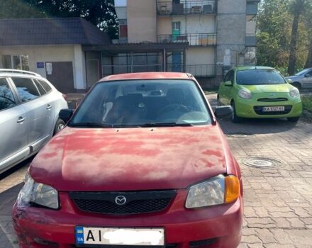 Червоний Мазда 323, об'ємом двигуна 1.6 л та пробігом 200 тис. км за 2000 $, фото 2 на Automoto.ua