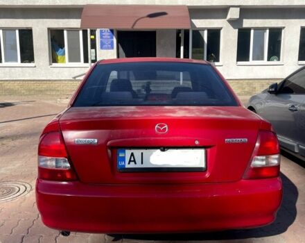 Червоний Мазда 323, об'ємом двигуна 1.6 л та пробігом 200 тис. км за 2000 $, фото 1 на Automoto.ua