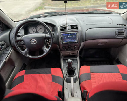 Красный Мазда 323, объемом двигателя 1.6 л и пробегом 333 тыс. км за 1500 $, фото 6 на Automoto.ua