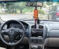 Червоний Мазда 323, об'ємом двигуна 2 л та пробігом 188 тис. км за 2500 $, фото 1 на Automoto.ua