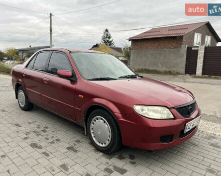 Красный Мазда 323, объемом двигателя 1.6 л и пробегом 333 тыс. км за 1500 $, фото 2 на Automoto.ua