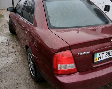 Красный Мазда 323, объемом двигателя 2 л и пробегом 2 тыс. км за 1700 $, фото 2 на Automoto.ua