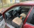 Червоний Мазда 323, об'ємом двигуна 2 л та пробігом 167 тис. км за 2400 $, фото 2 на Automoto.ua