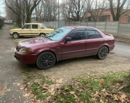 Червоний Мазда 323, об'ємом двигуна 2 л та пробігом 167 тис. км за 2400 $, фото 8 на Automoto.ua