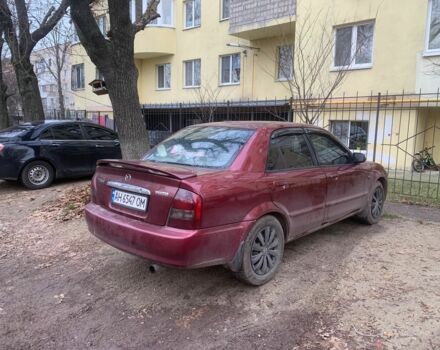 Червоний Мазда 323, об'ємом двигуна 2 л та пробігом 167 тис. км за 2400 $, фото 3 на Automoto.ua