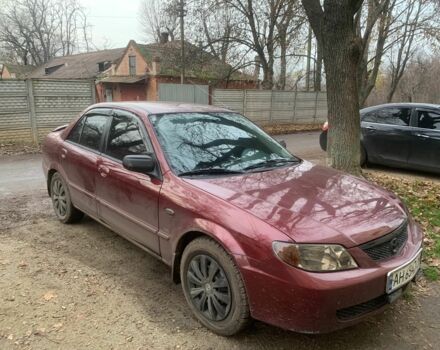 Червоний Мазда 323, об'ємом двигуна 2 л та пробігом 167 тис. км за 2400 $, фото 6 на Automoto.ua