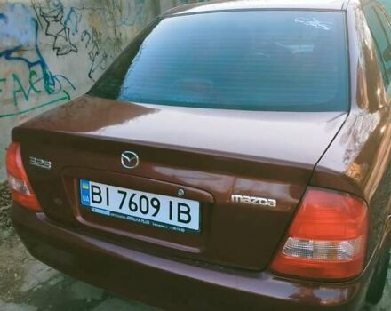Червоний Мазда 323, об'ємом двигуна 1.6 л та пробігом 245 тис. км за 2800 $, фото 1 на Automoto.ua
