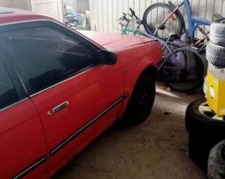 Червоний Мазда 323, об'ємом двигуна 1.72 л та пробігом 450 тис. км за 700 $, фото 2 на Automoto.ua