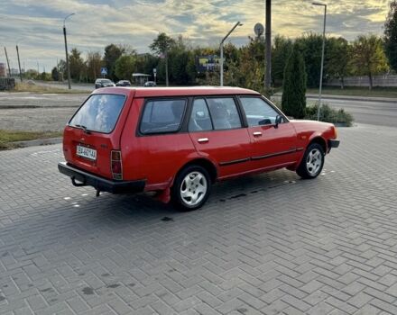 Красный Мазда 323, объемом двигателя 0 л и пробегом 250 тыс. км за 600 $, фото 3 на Automoto.ua