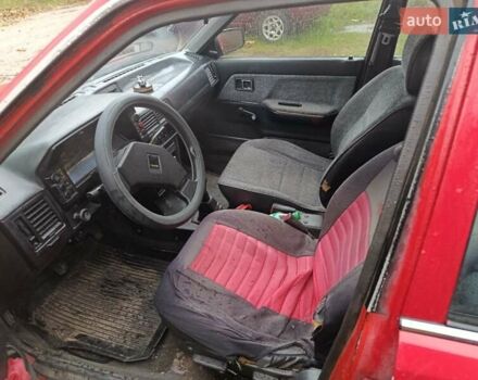 Червоний Мазда 323, об'ємом двигуна 1.49 л та пробігом 350 тис. км за 900 $, фото 4 на Automoto.ua