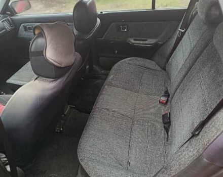 Червоний Мазда 323, об'ємом двигуна 1.49 л та пробігом 350 тис. км за 900 $, фото 5 на Automoto.ua