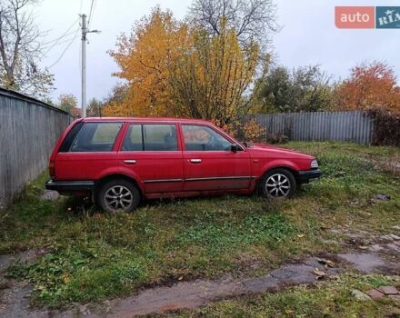 Червоний Мазда 323, об'ємом двигуна 1.49 л та пробігом 350 тис. км за 900 $, фото 2 на Automoto.ua