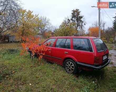 Червоний Мазда 323, об'ємом двигуна 1.49 л та пробігом 350 тис. км за 900 $, фото 1 на Automoto.ua