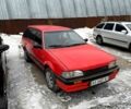 Червоний Мазда 323, об'ємом двигуна 1.3 л та пробігом 200 тис. км за 850 $, фото 1 на Automoto.ua