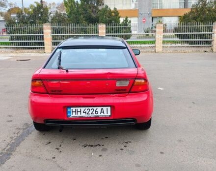 Красный Мазда 323, объемом двигателя 1.5 л и пробегом 270 тыс. км за 1500 $, фото 2 на Automoto.ua