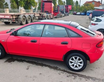 Красный Мазда 323, объемом двигателя 1.5 л и пробегом 270 тыс. км за 1500 $, фото 1 на Automoto.ua