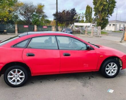 Красный Мазда 323, объемом двигателя 1.5 л и пробегом 270 тыс. км за 1500 $, фото 3 на Automoto.ua